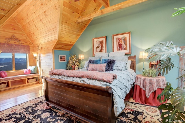 bedroom with wooden ceiling, vaulted ceiling with beams, and wood-type flooring