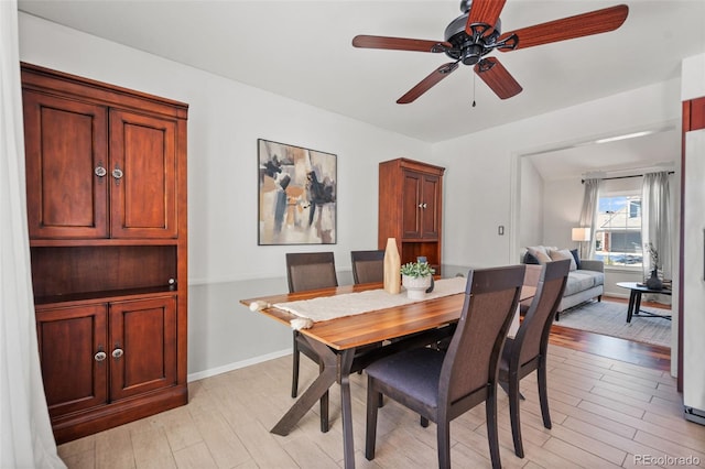 dining area featuring ceiling fan and light hardwood / wood-style floors