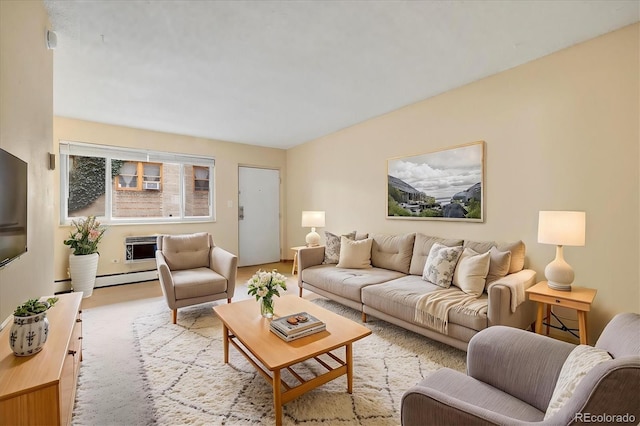 living area featuring a baseboard heating unit and light colored carpet