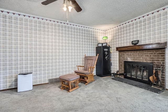 6314 S Johnson St, Littleton, CO 80123 - living area with a textured ceiling, carpet flooring, a ceiling fan, wallpapered walls, and a fireplace