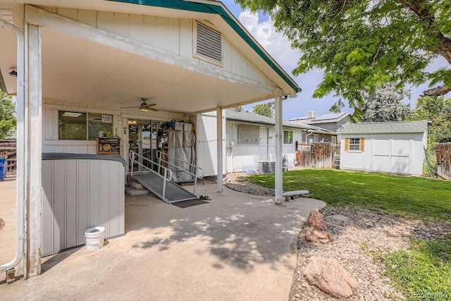 6314 S Johnson St, Littleton, CO 80123 - view of patio / terrace with a ceiling fan and a shed