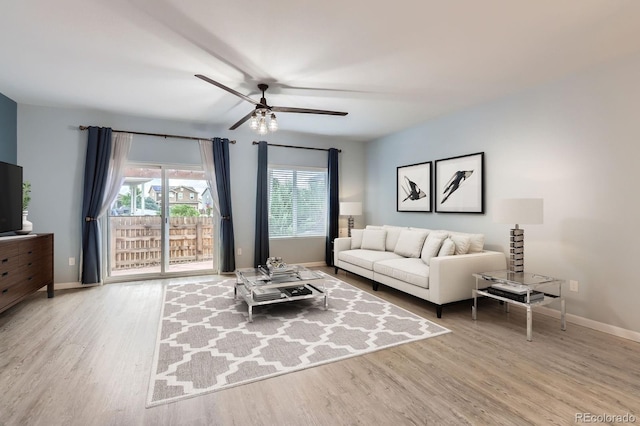 449 Vista Blvd, Lochbuie, CO 80603 - living room featuring a ceiling fan and wood finished floors