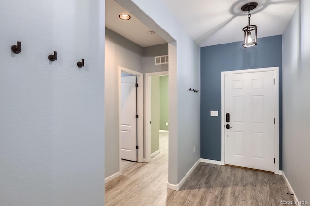 449 Vista Blvd, Lochbuie, CO 80603 - foyer entrance with light wood-style flooring and baseboards