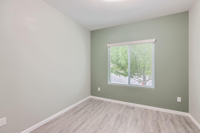 449 Vista Blvd, Lochbuie, CO 80603 - spare room featuring light wood-style flooring