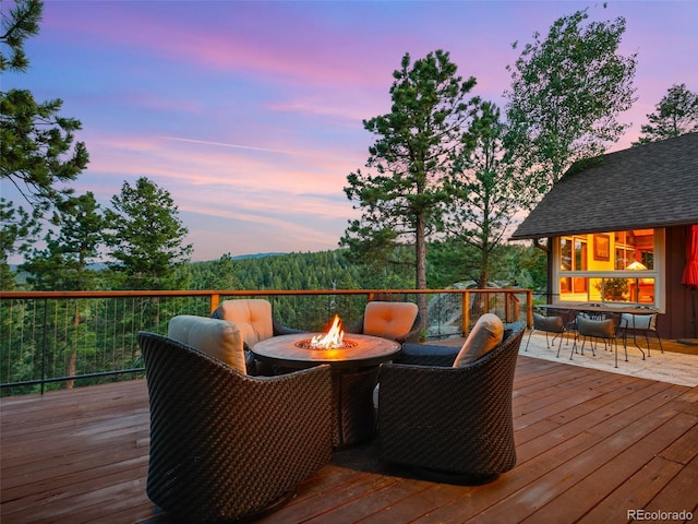 28550 Cavan Ln, Evergreen, CO 80439 - deck featuring a fire pit