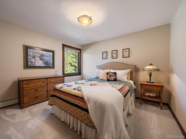 28550 Cavan Ln, Evergreen, CO 80439 - bedroom with light carpet and baseboard heating