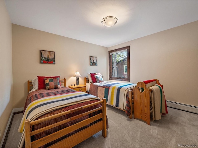 28550 Cavan Ln, Evergreen, CO 80439 - bedroom with carpet floors and a baseboard radiator