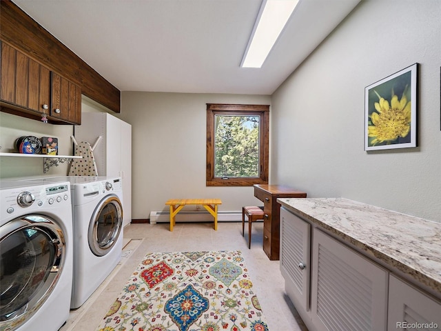 28550 Cavan Ln, Evergreen, CO 80439 - washroom featuring baseboard heating, independent washer and dryer, and cabinet space