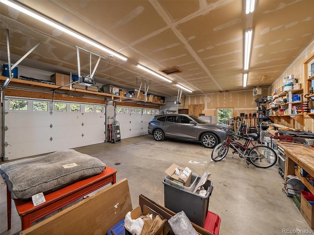 28550 Cavan Ln, Evergreen, CO 80439 - garage featuring a garage door opener