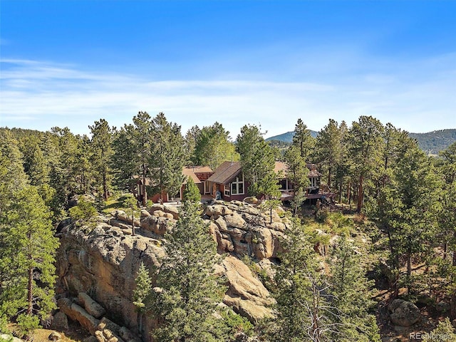 28550 Cavan Ln, Evergreen, CO 80439 - aerial overview of property's location featuring a mountain backdrop