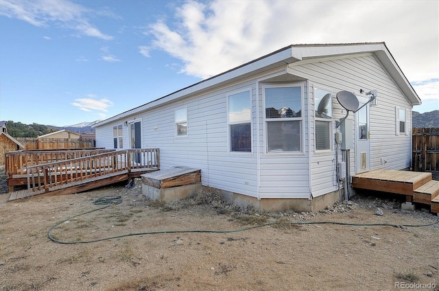 rear view of house with a deck