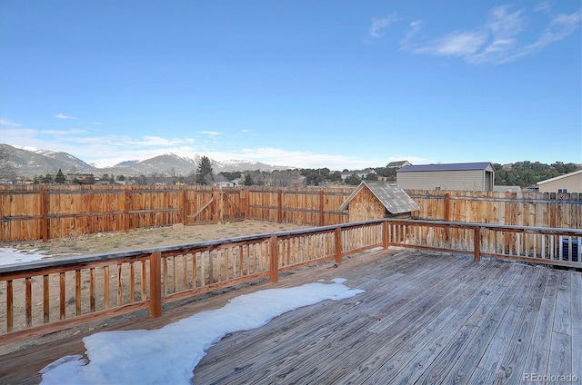 wooden terrace featuring a mountain view