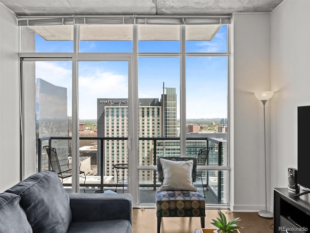 891 14th St Unit 3411, Denver, CO 80202 - living area featuring expansive windows and wood finished floors