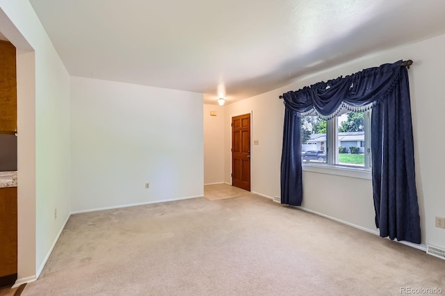 912 S Kingston St, Aurora, CO 80012 - carpeted empty room featuring baseboards