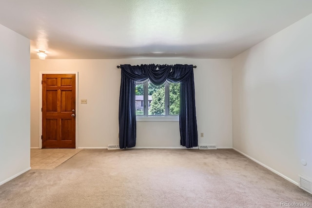 912 S Kingston St, Aurora, CO 80012 - carpeted spare room featuring baseboards