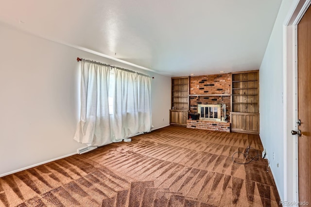912 S Kingston St, Aurora, CO 80012 - unfurnished living room with carpet, built in features, a fireplace, and baseboards