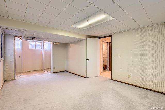 912 S Kingston St, Aurora, CO 80012 - below grade area with light carpet and baseboards