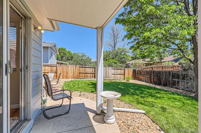 912 S Kingston St, Aurora, CO 80012 - view of yard with a patio