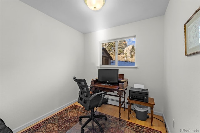 office with hardwood / wood-style flooring