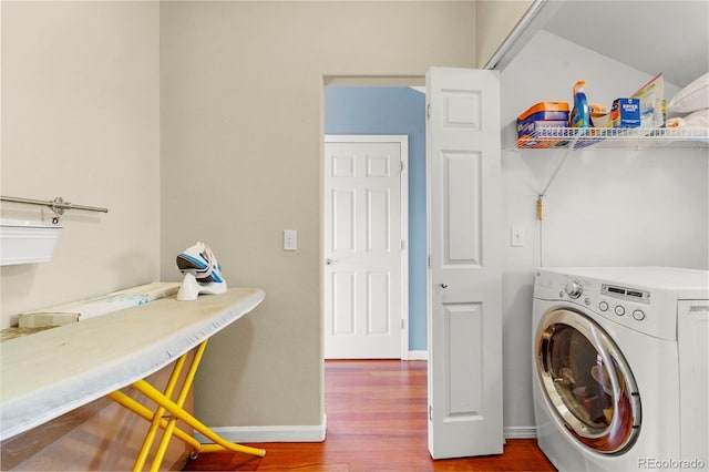 laundry room featuring washer / dryer and hardwood / wood-style floors