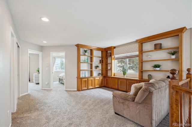 8114 Briar Ridge Dr, Castle Pines, CO 80108 - living area with light colored carpet, recessed lighting, and baseboards