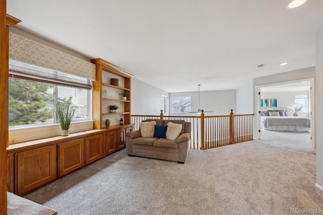 8114 Briar Ridge Dr, Castle Pines, CO 80108 - living area featuring carpet floors and ceiling fan