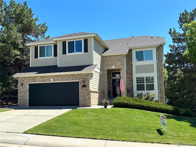 8114 Briar Ridge Dr, Castle Pines, CO 80108 - view of front facade with an attached garage, brick siding, a front lawn, driveway, and roof with shingles