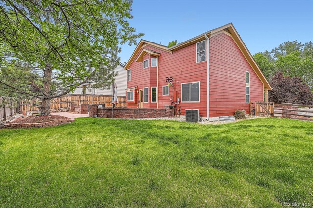 5784 W 81st Cir, Arvada, CO 80003 - back of property with central air condition unit and a patio