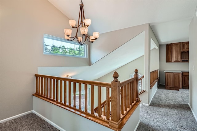 5784 W 81st Cir, Arvada, CO 80003 - staircase with carpet flooring, baseboards, lofted ceiling, and a chandelier