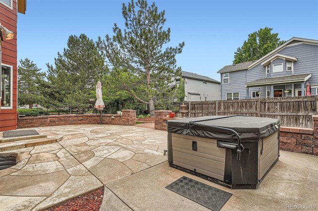 5784 W 81st Cir, Arvada, CO 80003 - view of patio with a hot tub