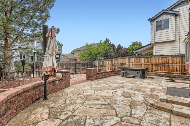 5784 W 81st Cir, Arvada, CO 80003 - fenced backyard with a patio area