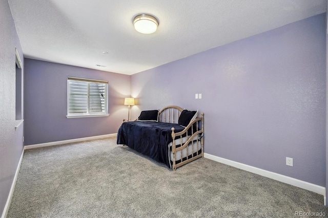 16498 E Lake Dr, Centennial, CO 80016 - carpeted bedroom with baseboards