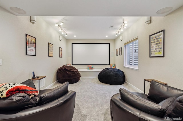 16498 E Lake Dr, Centennial, CO 80016 - cinema room with rail lighting and carpet flooring