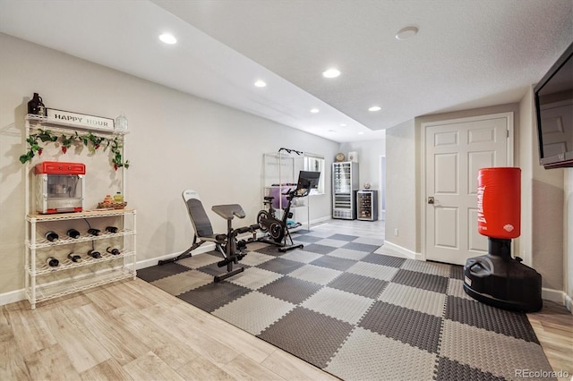 16498 E Lake Dr, Centennial, CO 80016 - workout area with recessed lighting and wood finished floors