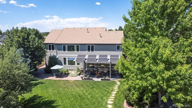 16498 E Lake Dr, Centennial, CO 80016 - back of property featuring a patio area, a yard, and outdoor dining space