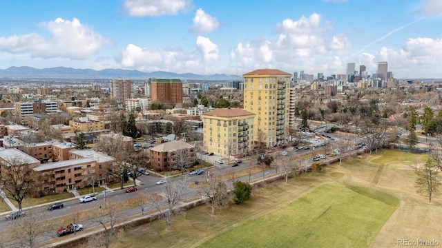 drone / aerial view with a city view and a mountain view