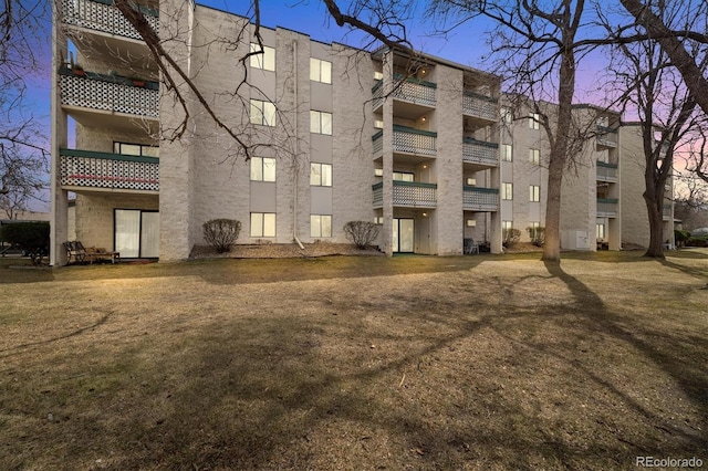 7770 W 38th Ave Unit 108, Wheat Ridge, CO 80033 - view of property at dusk