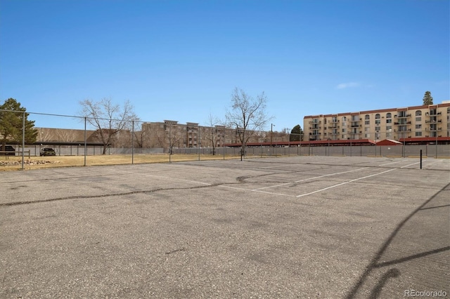 7770 W 38th Ave Unit 108, Wheat Ridge, CO 80033 - view of tennis court featuring fence
