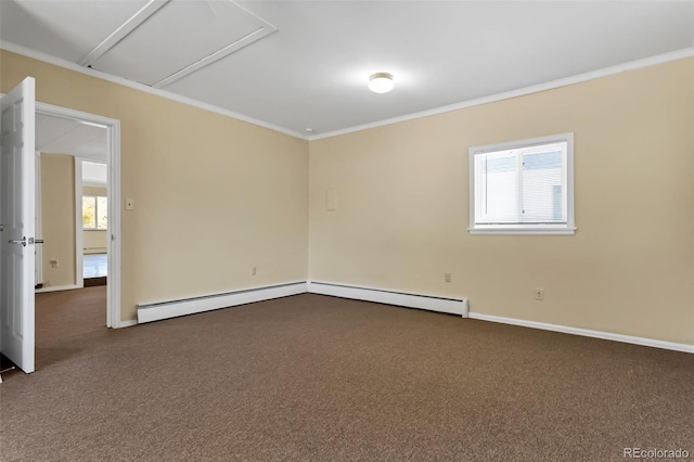 carpeted empty room featuring baseboard heating and crown molding