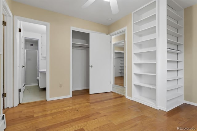 unfurnished bedroom with light hardwood / wood-style flooring and ceiling fan