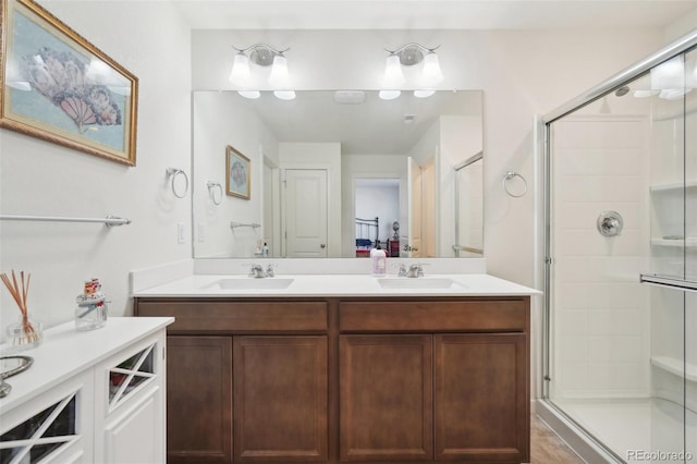 bathroom with vanity and walk in shower