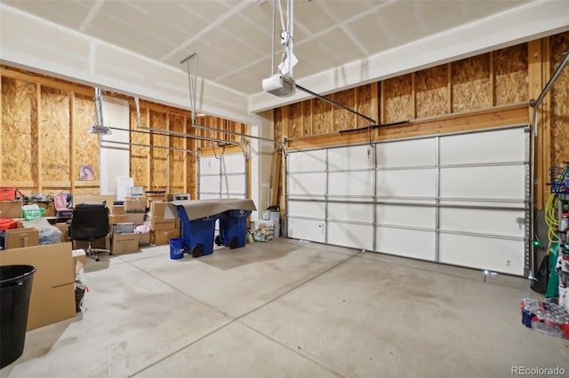 garage featuring a garage door opener