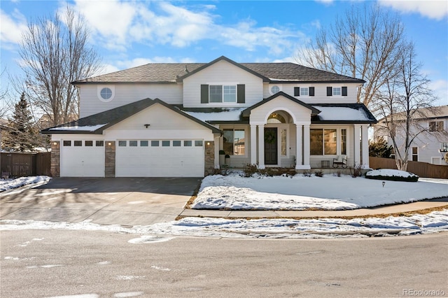 front of property featuring a garage