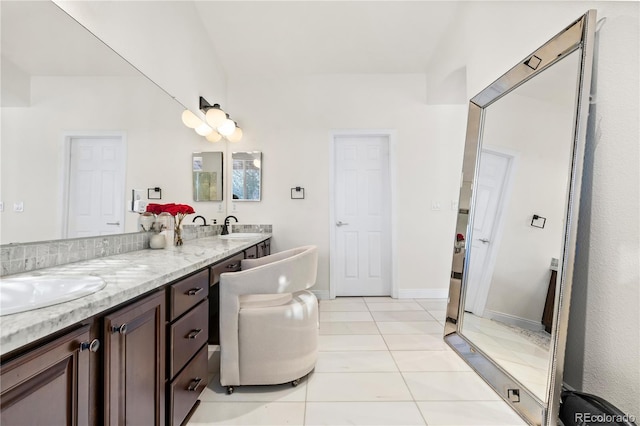 bathroom with vanity and tile patterned floors