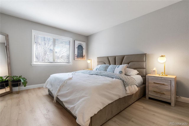 bedroom with light hardwood / wood-style flooring