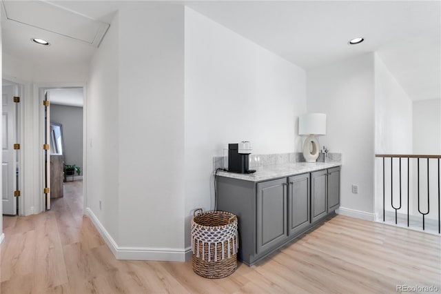 hall with light hardwood / wood-style floors