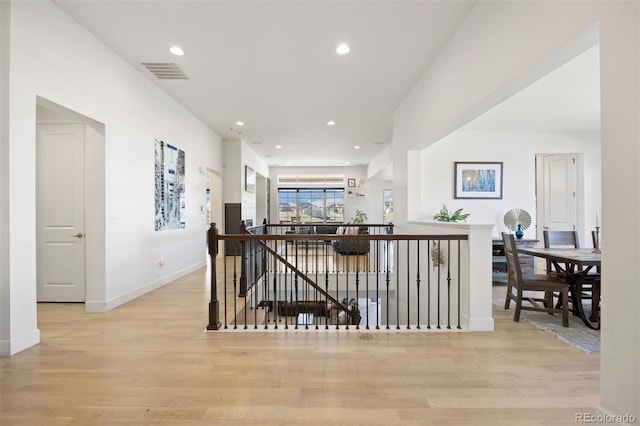 hallway with light wood-type flooring