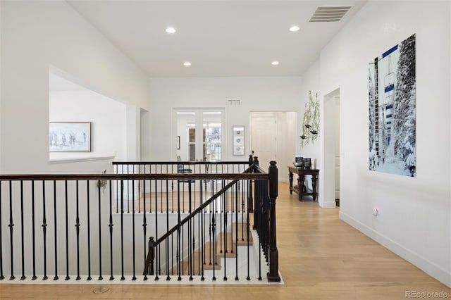 hallway featuring light wood-type flooring