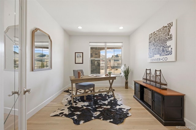 home office featuring light hardwood / wood-style floors