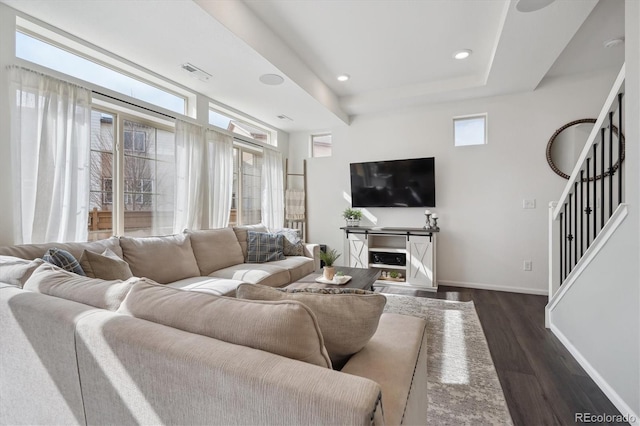 living room featuring recessed lighting, visible vents, baseboards, stairs, and dark wood-style floors